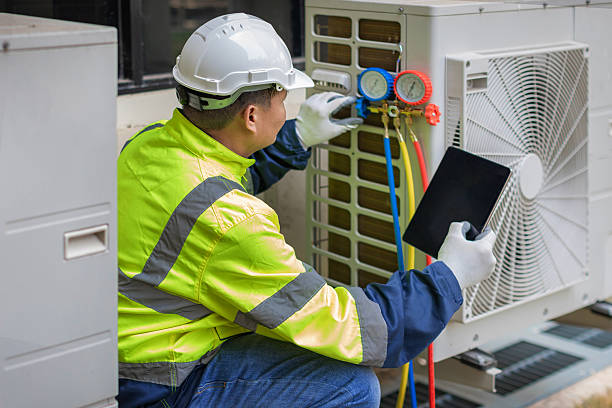 Professional Hvac technician working in Janesville, WI